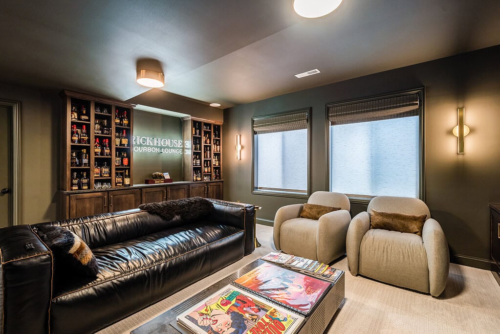 A lounge area in a finished basement from Compass Homes.