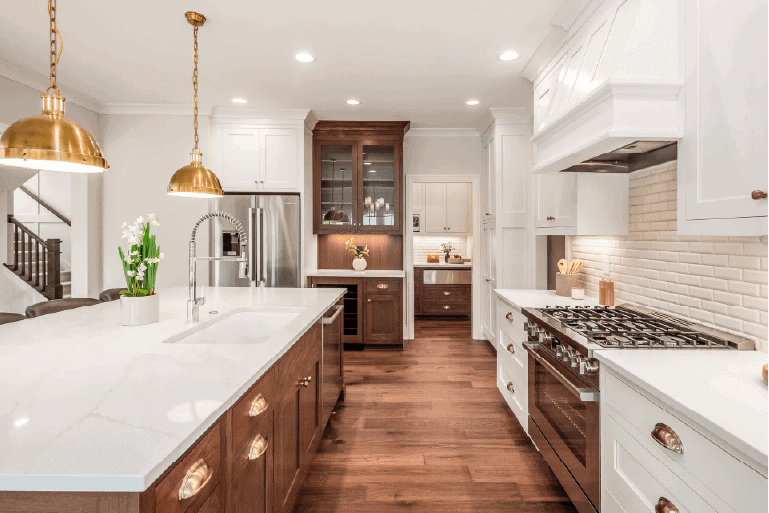 The interior of a kitchen by Compass Homes.