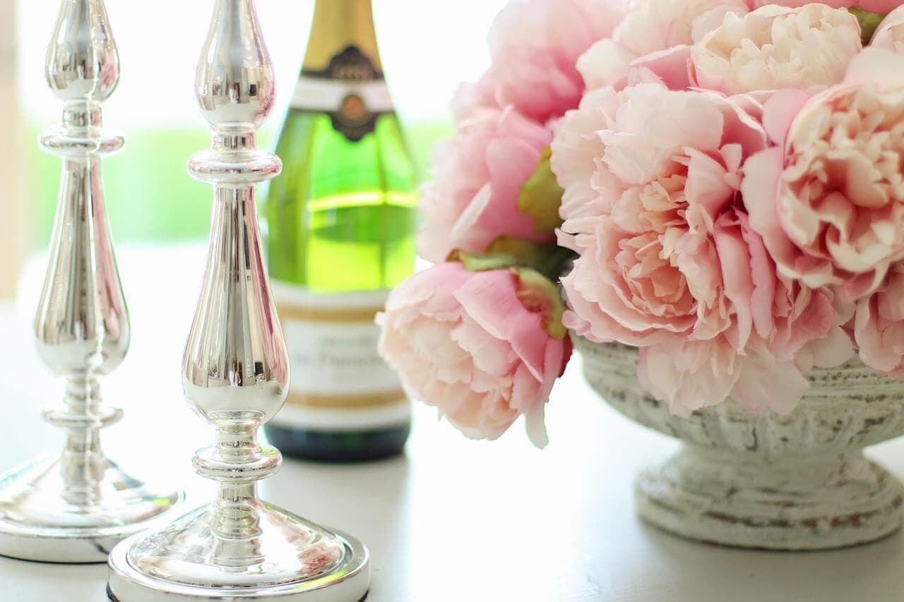 Pink peonies on a table.