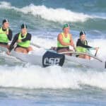 The WildCat surf canoe in the surf