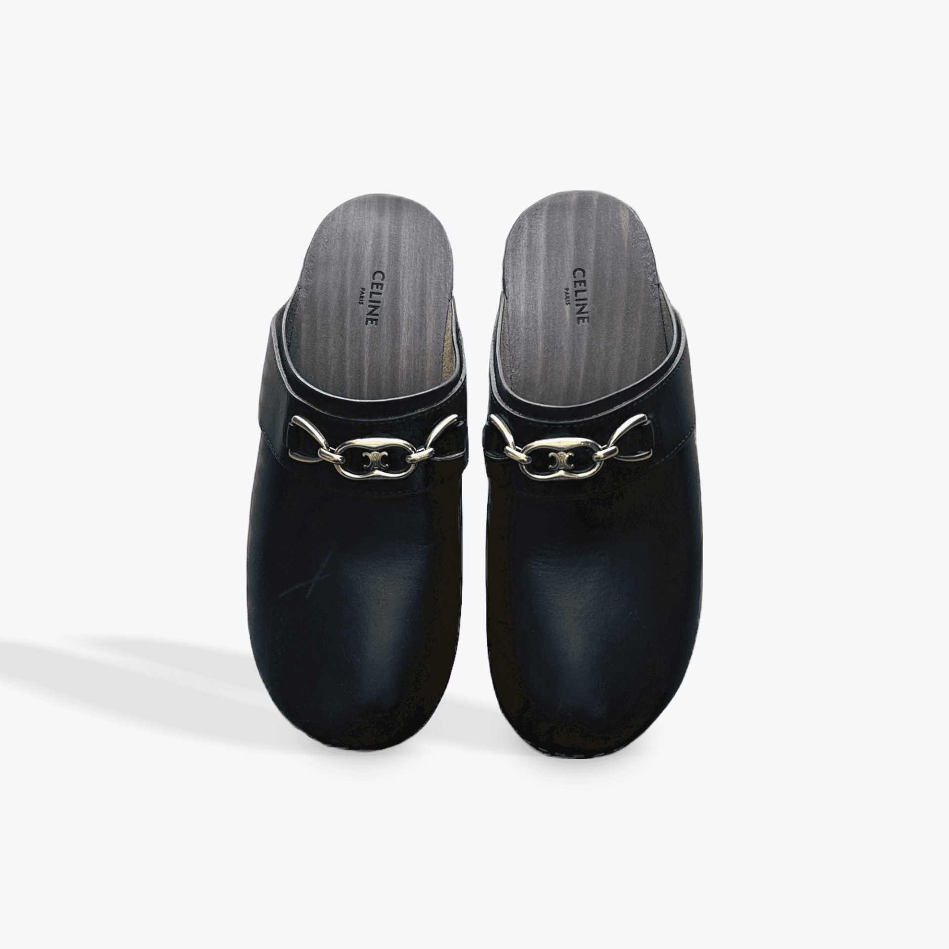Sabots Celine "Les Bois" en cuir noir