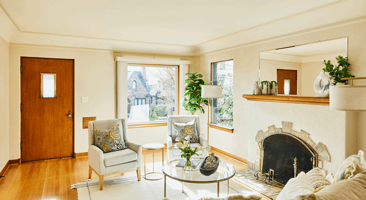 Modern living room with fireplace, large windows, and cozy seating in Walnut Creek, CA.