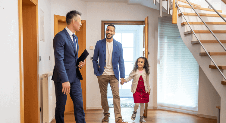 Real estate agents welcoming a family into a home in Walnut Creek CA.