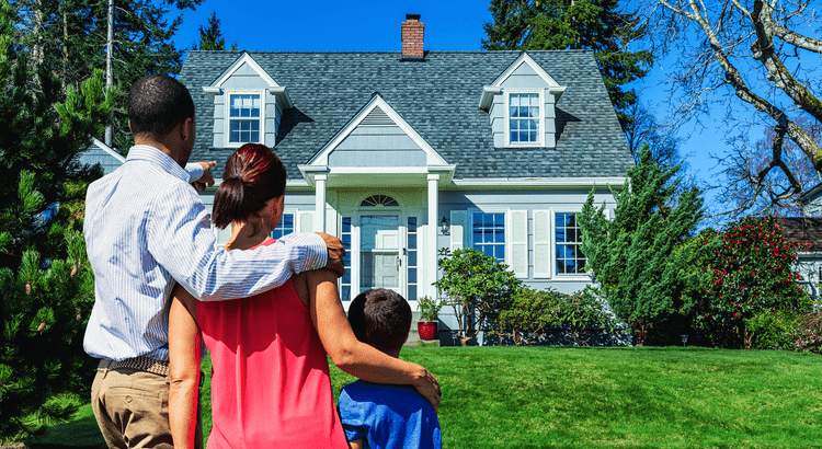 Bright family looking at their new Walnut Creek home with a sunny sky.