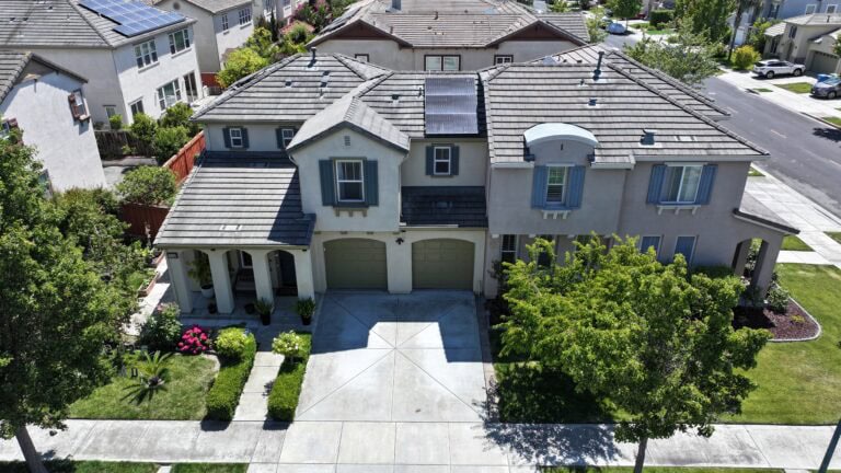 Beautiful residential home in Walnut Creek, CA with stunning landscaping and solar panels.