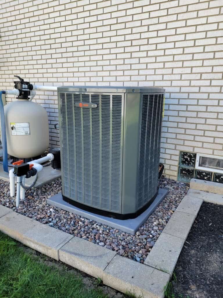 Reliable air conditioning and pool filter system installed by JP Heating & Cooling for home comfort.