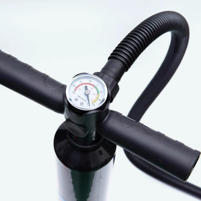 Close up of the manual hand air pump showing its pressure gauge, T handle and ribbed hose