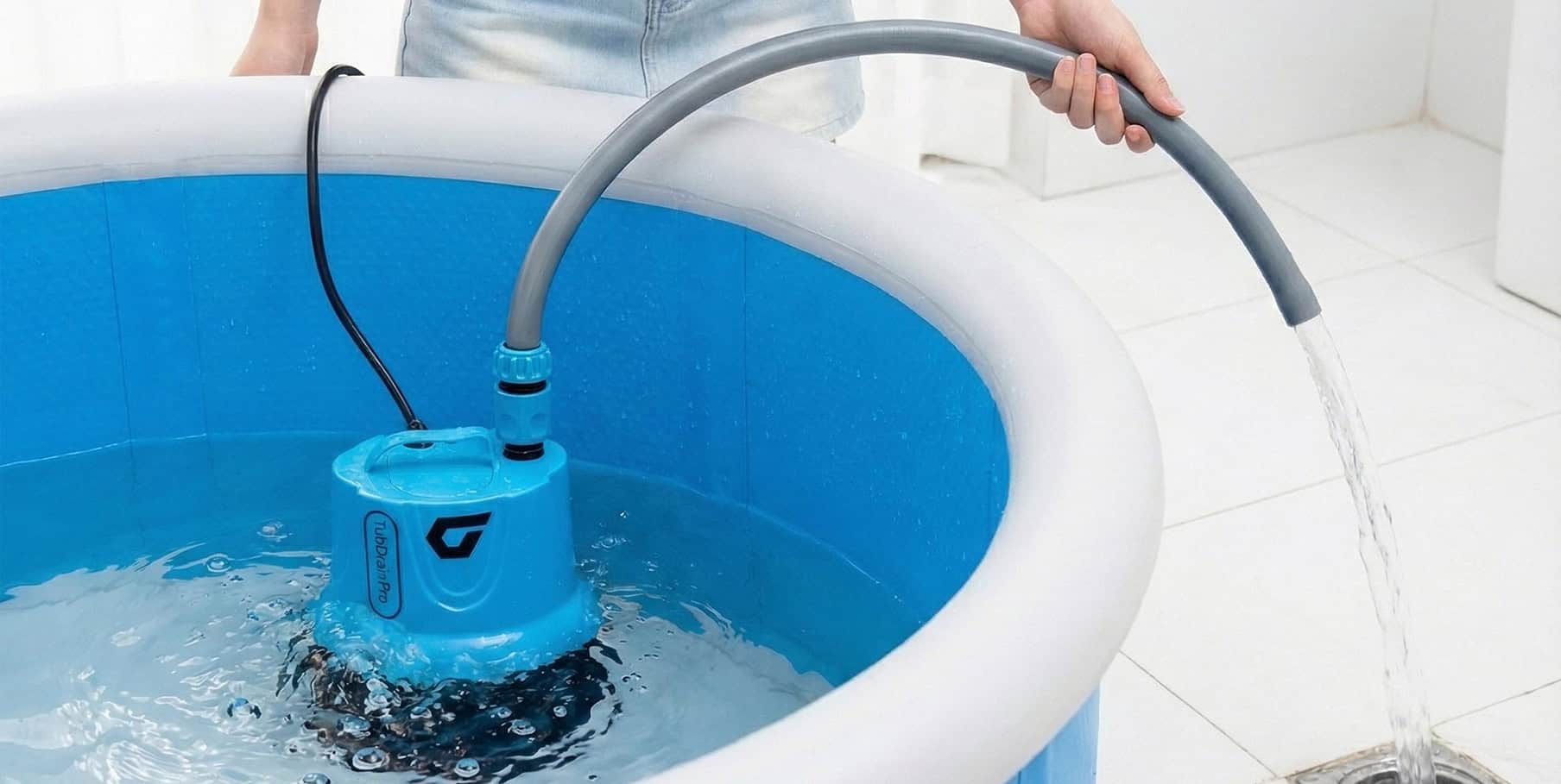TubDrainPro in pail at water source with pipe running to tub