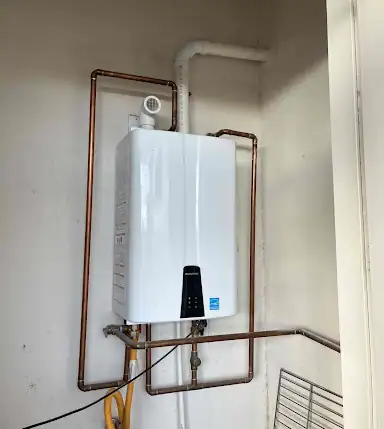 High-efficiency tankless water heater installation by professional plumbers at Cornwell Plumbing for reliable hot water solutions.