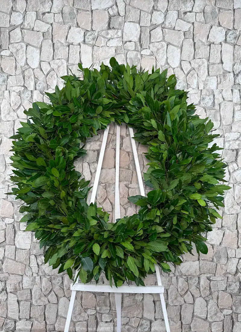 Corona funeraria de laurel