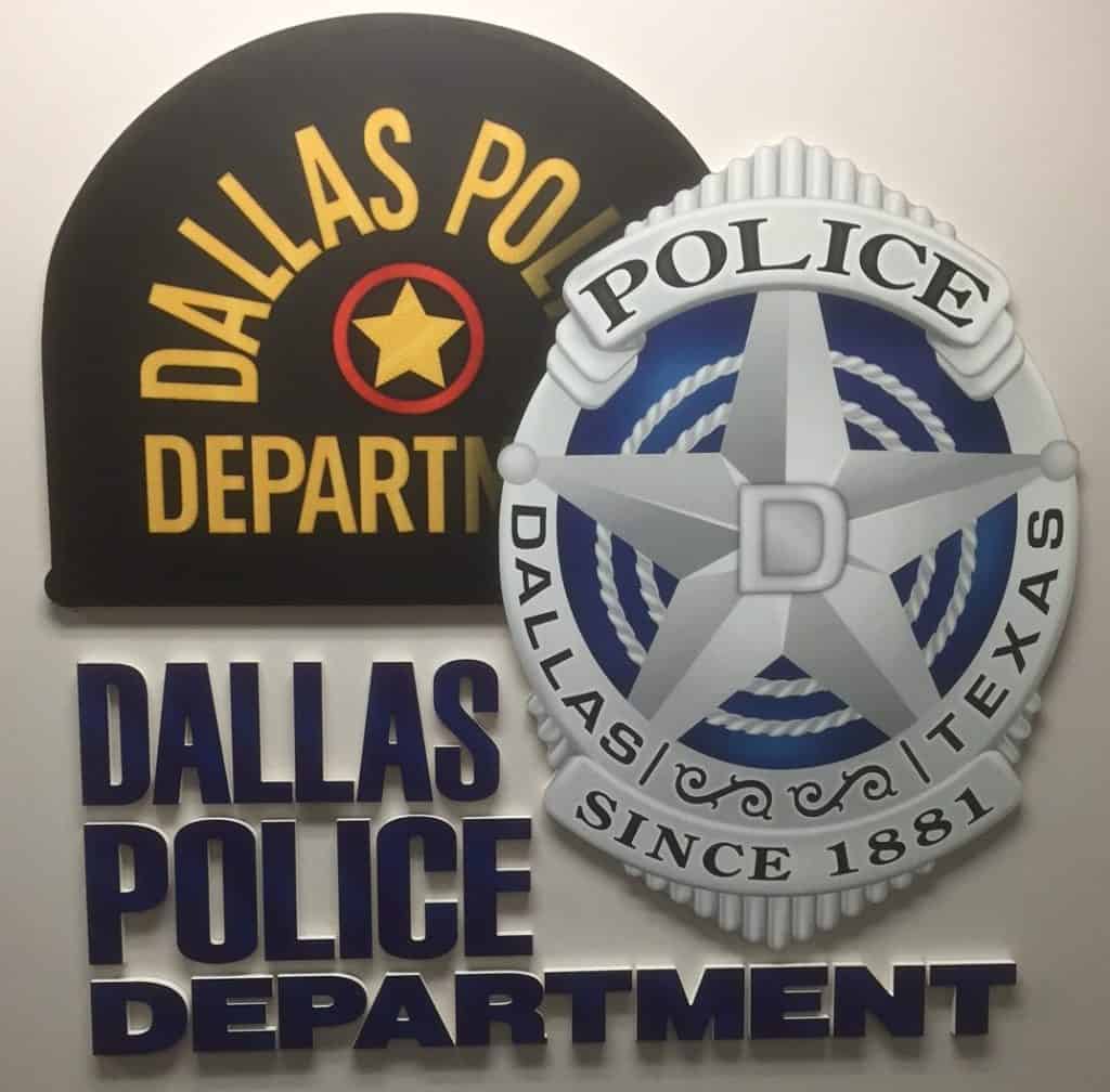 Dallas Police badge and Dallas Police Department emblem with department name and founding year.