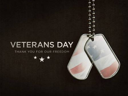Veterans Day dog tag with American flag design and stars on a dark background.