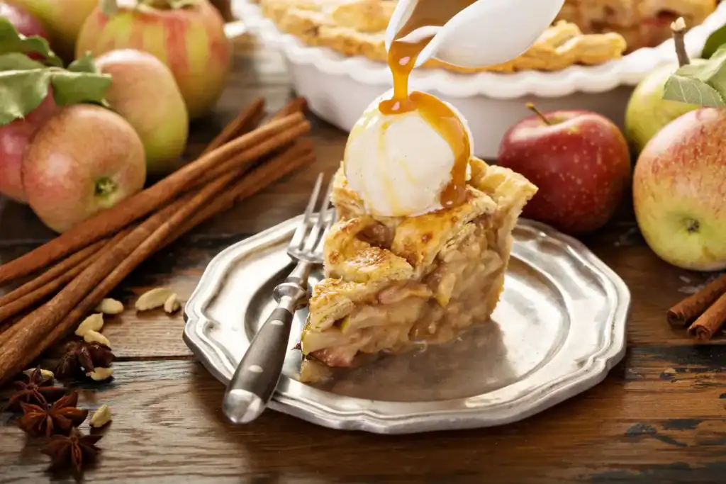 Apple Pie Ice Cream with caramel sauce drizzle.