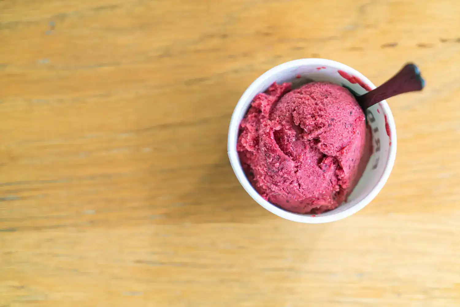 Delicious beet and raspberry sorbet served in a small bowl, perfect for a healthy, refreshing desser.