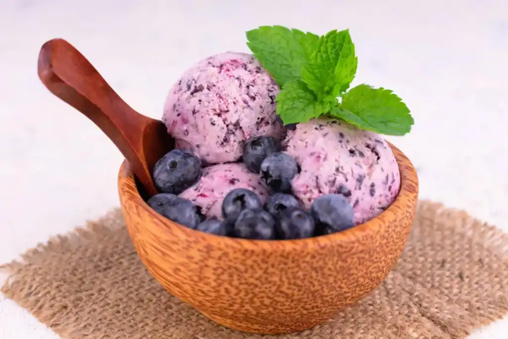 Delicious homemade blackberry sorbet with fresh berries and mint garnish. Perfect for a refreshing s.