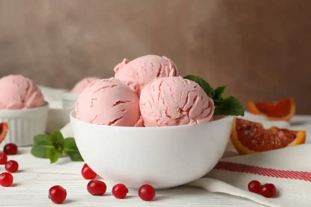 Delicious grapefruit sorbet served in a white bowl, perfect for a low-calorie treat.