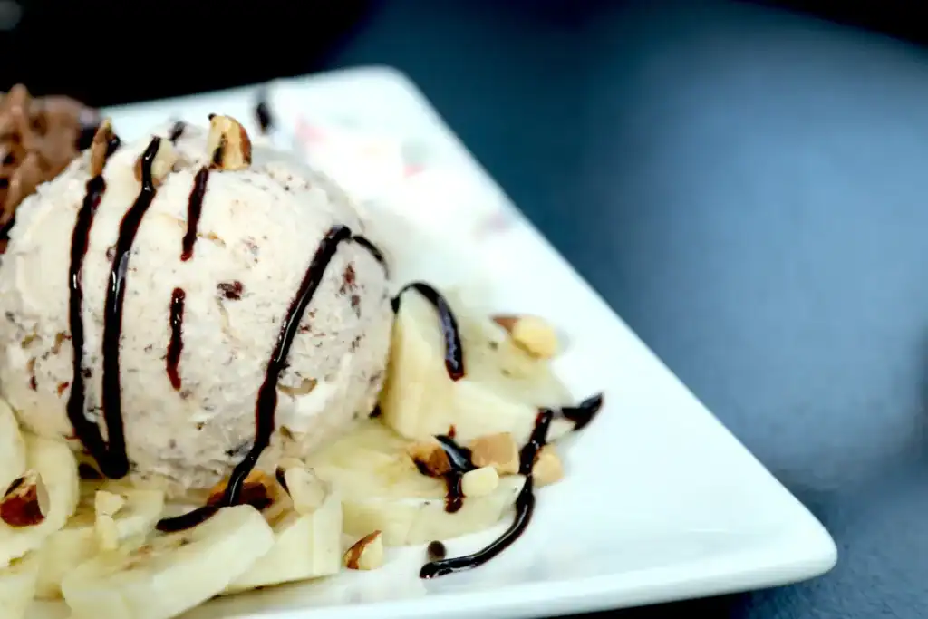 Keto Cinnamon Roll Ice Cream with Creamy Texture and Chocolate Drizzle.