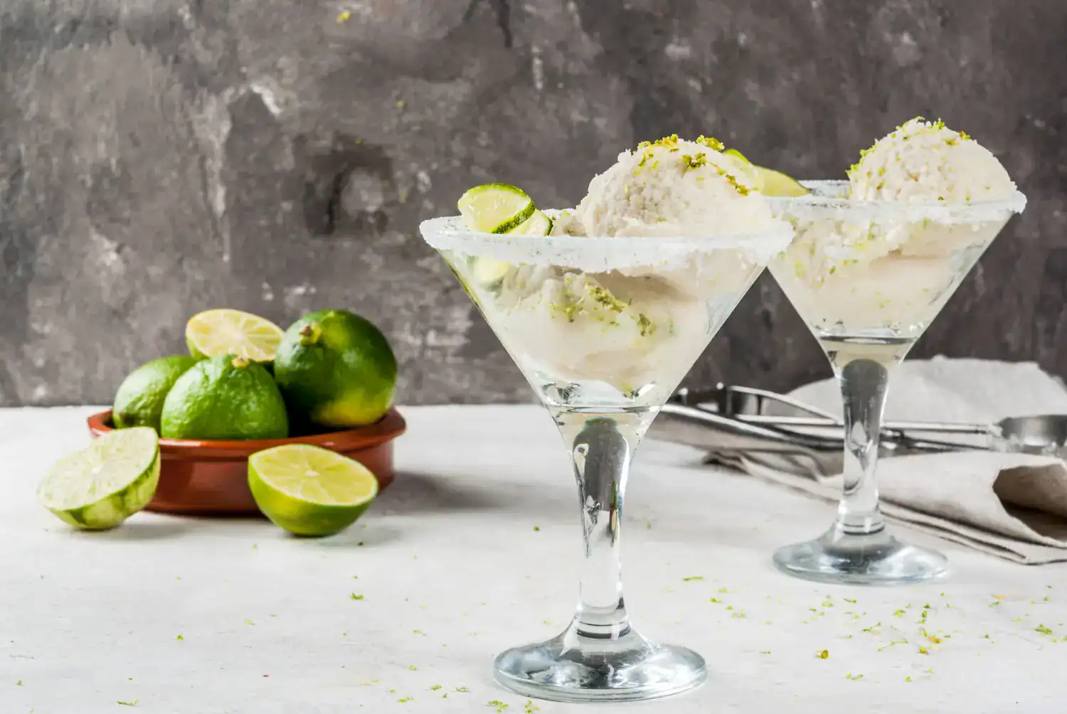Lemon Lime Ice Cream in elegant glasses, perfect for keto dessert lovers. Refreshing, tangy, and cre.