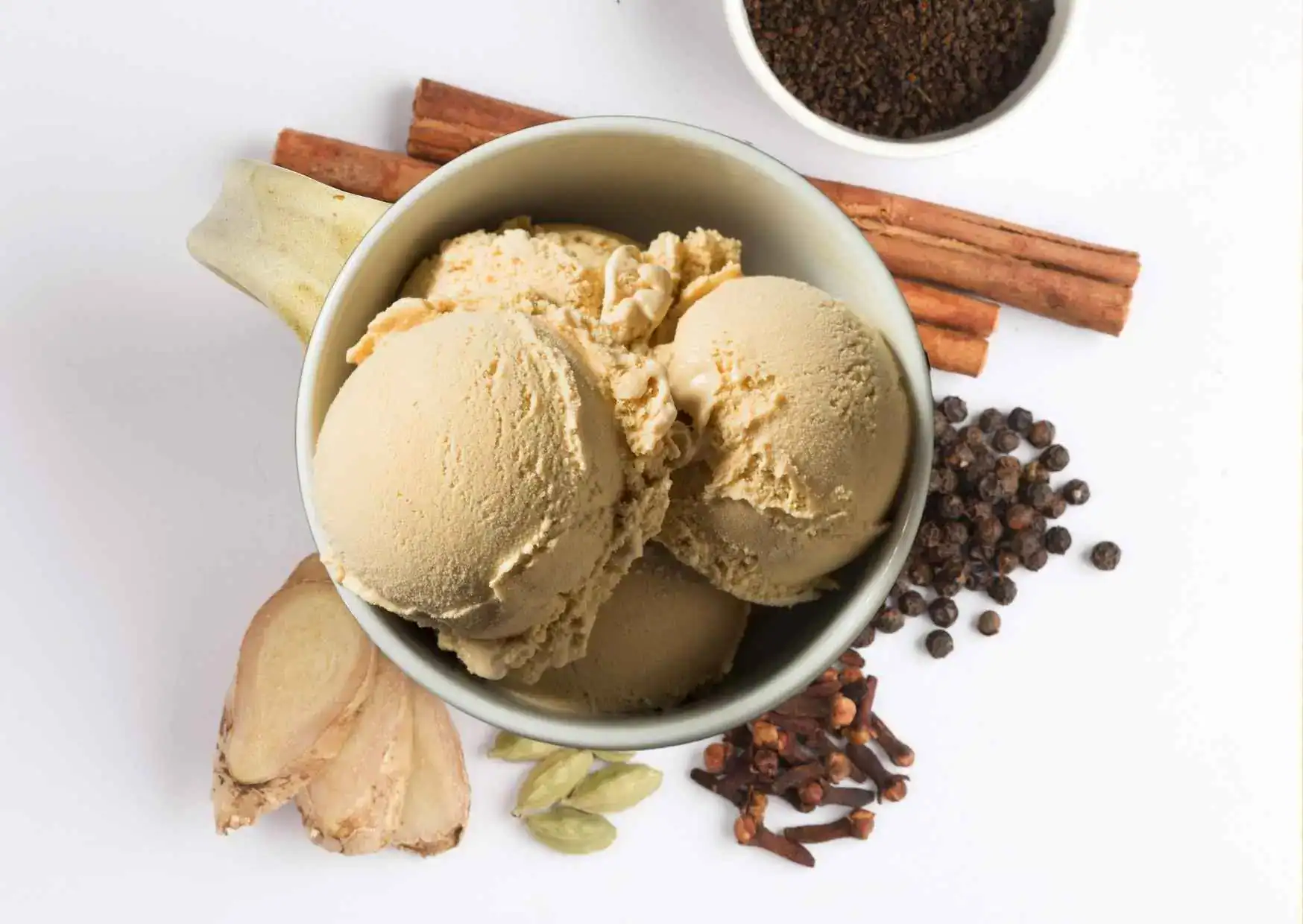 Delicious homemade spiced chai sorbet with aromatic cinnamon and black tea flavors. Perfect for a re.