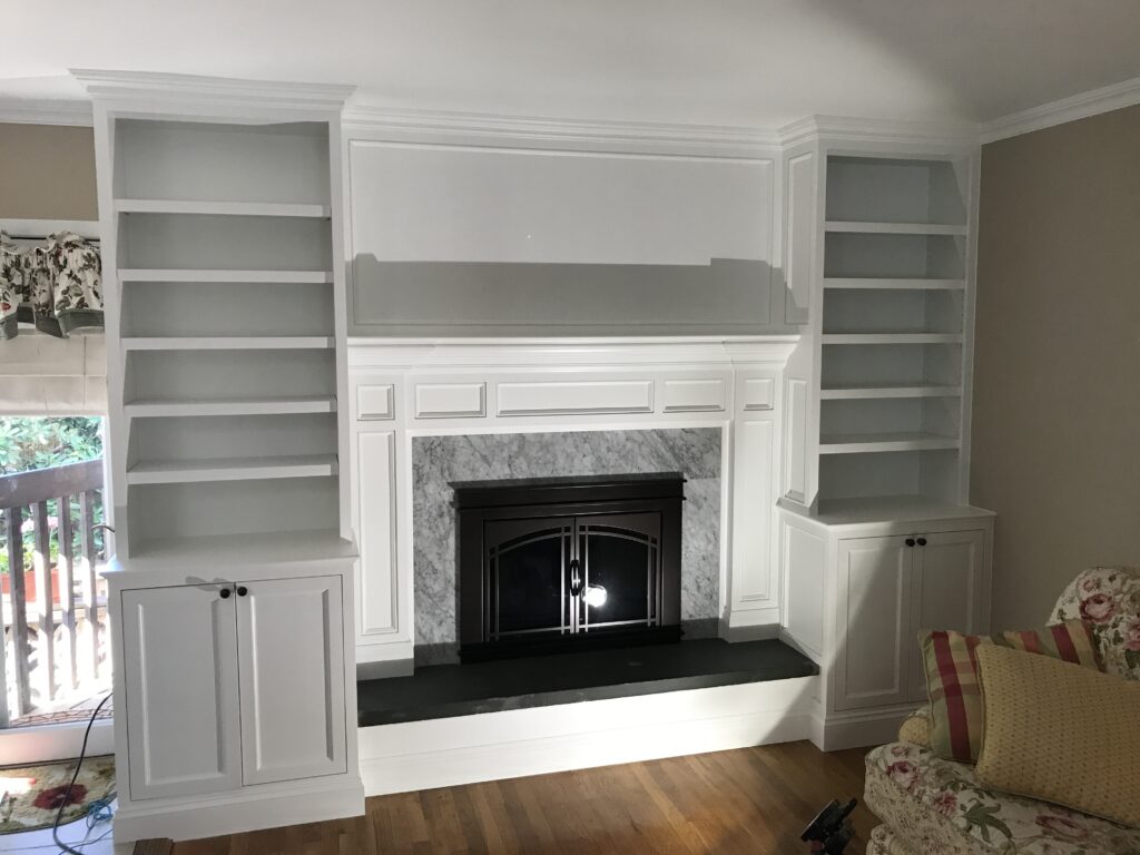 Custom Fireplace Surround with Raised Panels Installed in Jericho Ny by Creatively Done Homes Improvements