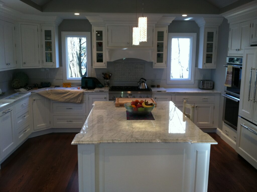 White Inset Door Kitchen Cabinets Installed During a Kitchen Remodel in Roslyn Ny by Creatively Done Homes Improvements