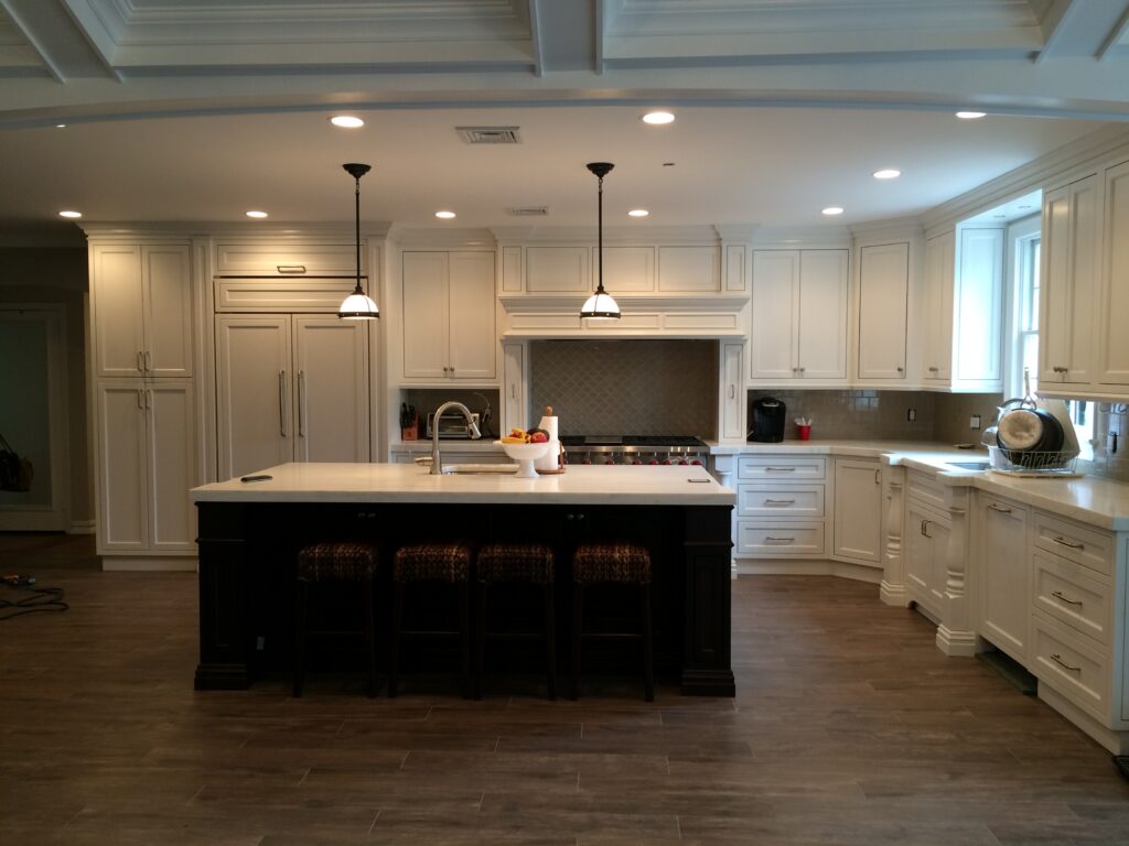 White Shaker Kitchen Cabinets Installed During a Kitchen Remodel in Syosset Ny by Creatively Done Homes Improvements
