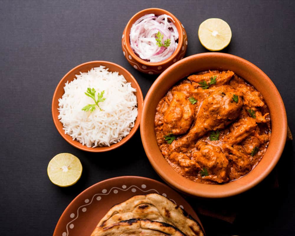 Authentic Indian cuisine Windang with flavorful curry, rice, and naan at Crown Indian Windang.