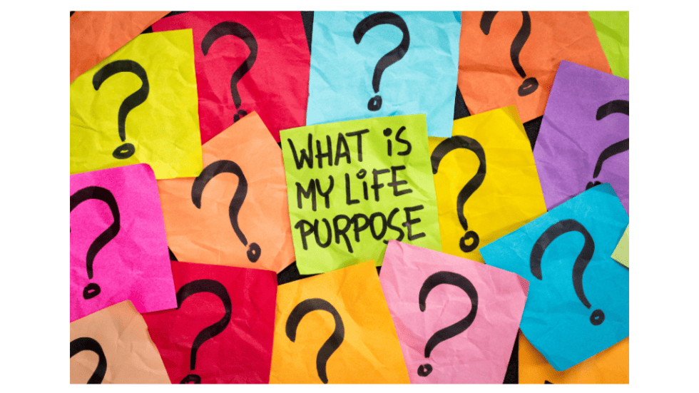 Colorful sticky notes with question marks and a central note asking about life purpose.
