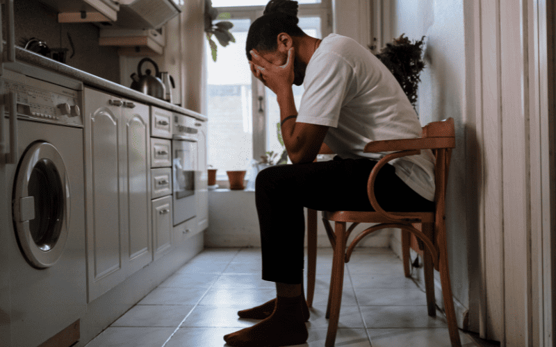Client in distress during hypnotherapy session at Darren Carter clinic.