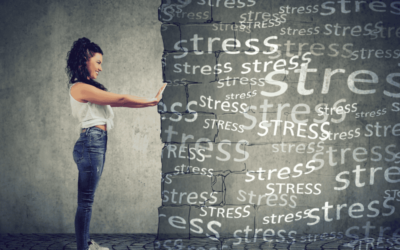 Woman experiencing stress, seeking hypnotherapy for relief.