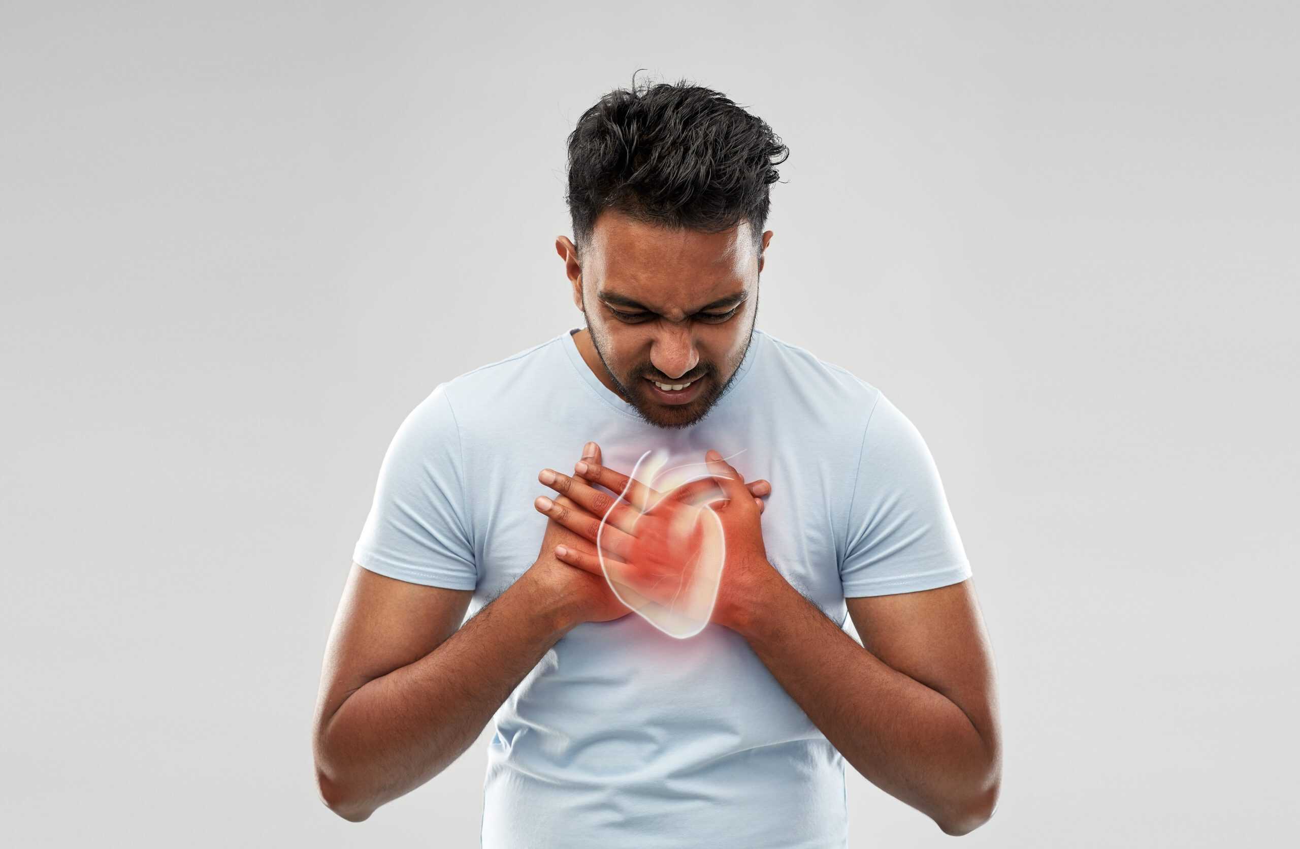 Chest pain and heart health awareness, man experiencing cardiac discomfort, health and wellness concept at Deepak Heart Institute, medical emergency.