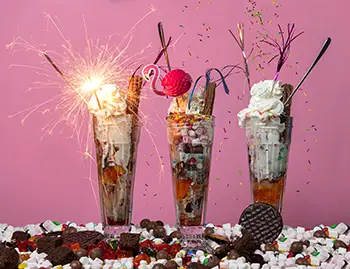 Knickerbockers Colorful sundaes with sparklers and toppings.
