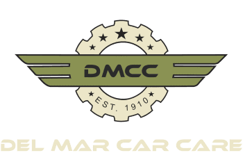 Del Mar Car Care logo featuring the DMCC emblem with a gear and star design, representing trusted automotive services in Del Mar.