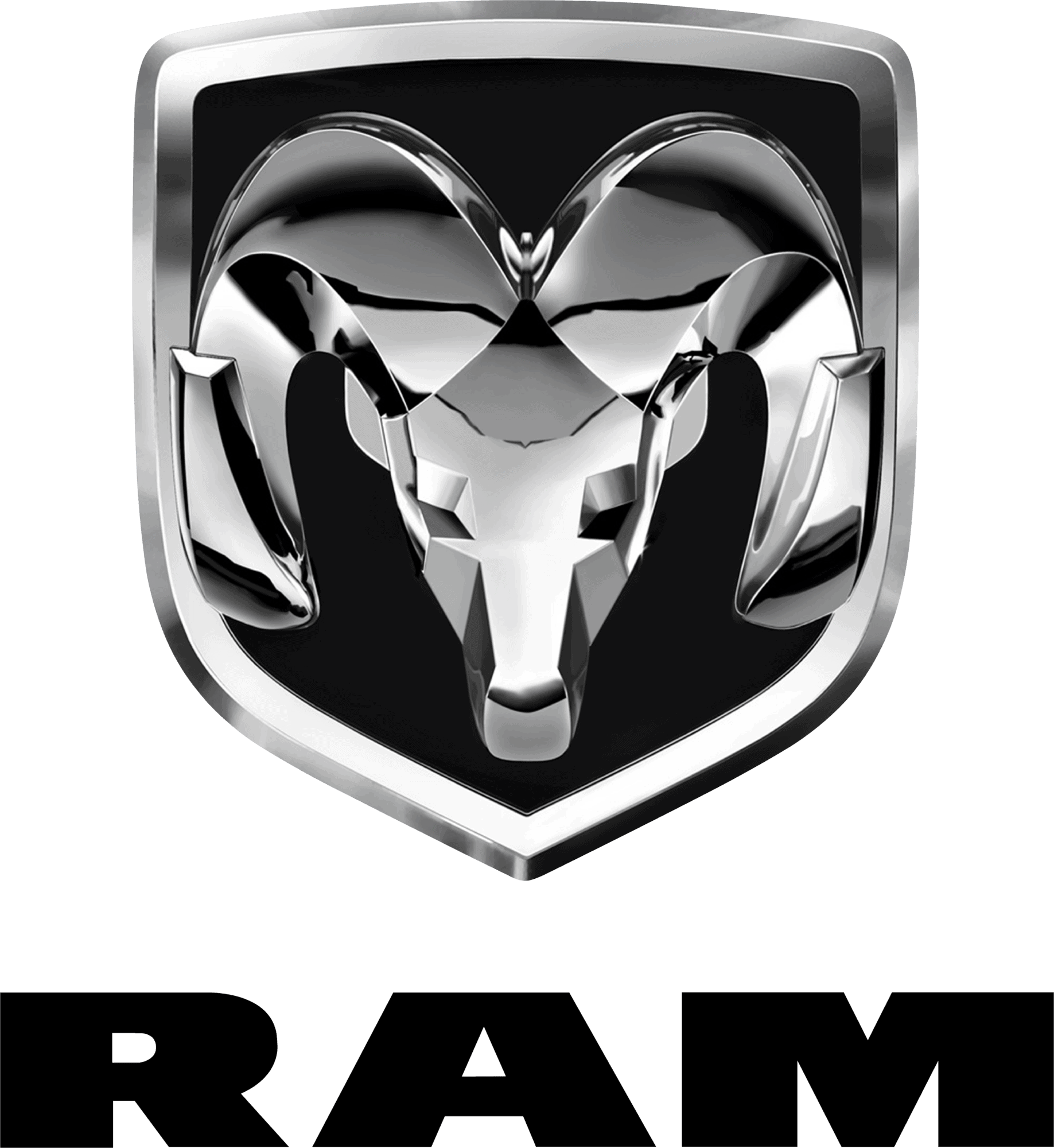 Close-up of Dodge Ram emblem on a vehicle, showcasing the chrome ram head badge with a black background.