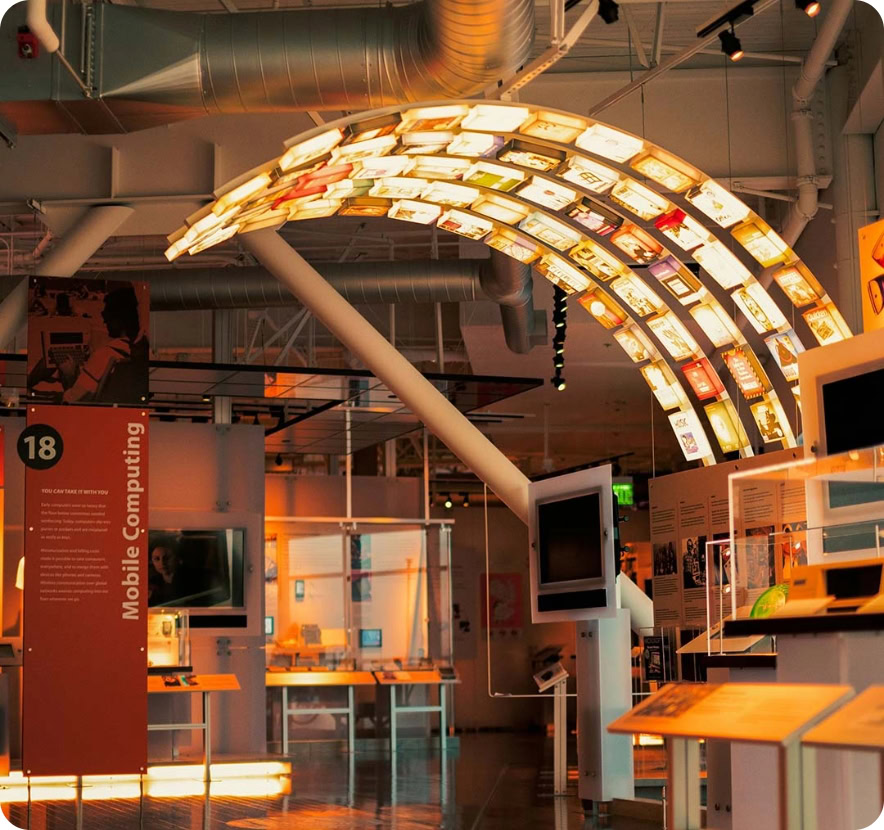 Colorful digital display arch with screens showcasing multimedia content.