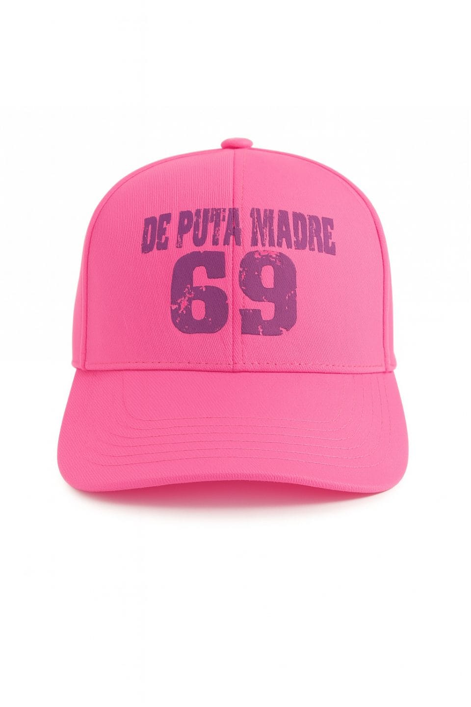 Bold pink De Puta Madre 69 streetwear baseball cap with distressed logo design.