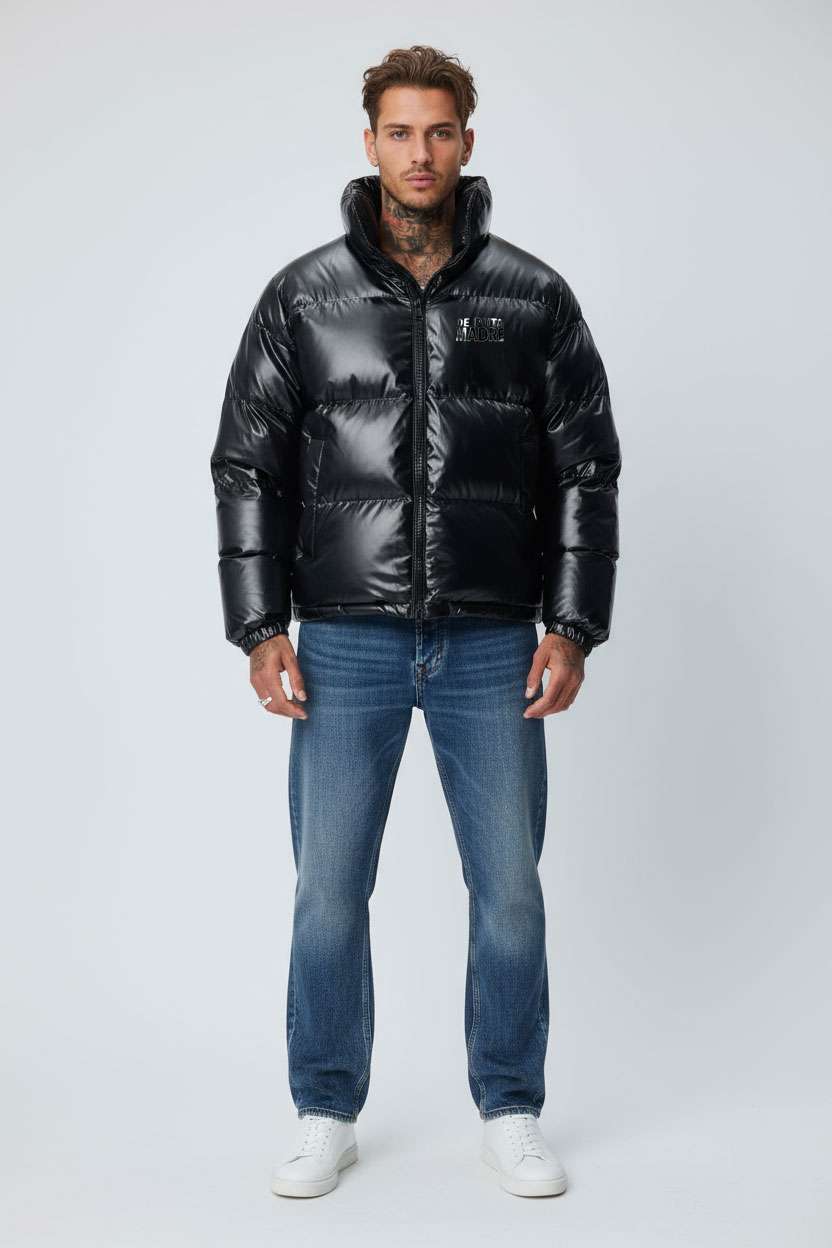 Down jacket with "De Puta Madre" logo on chest, stylish streetwear apparel for bold fashion statements.