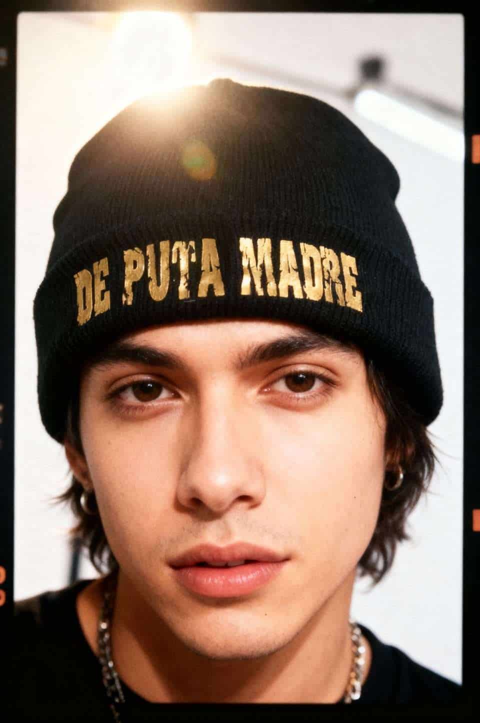 De puta madre bold beanie streetwear fashion black hat with gold lettering.