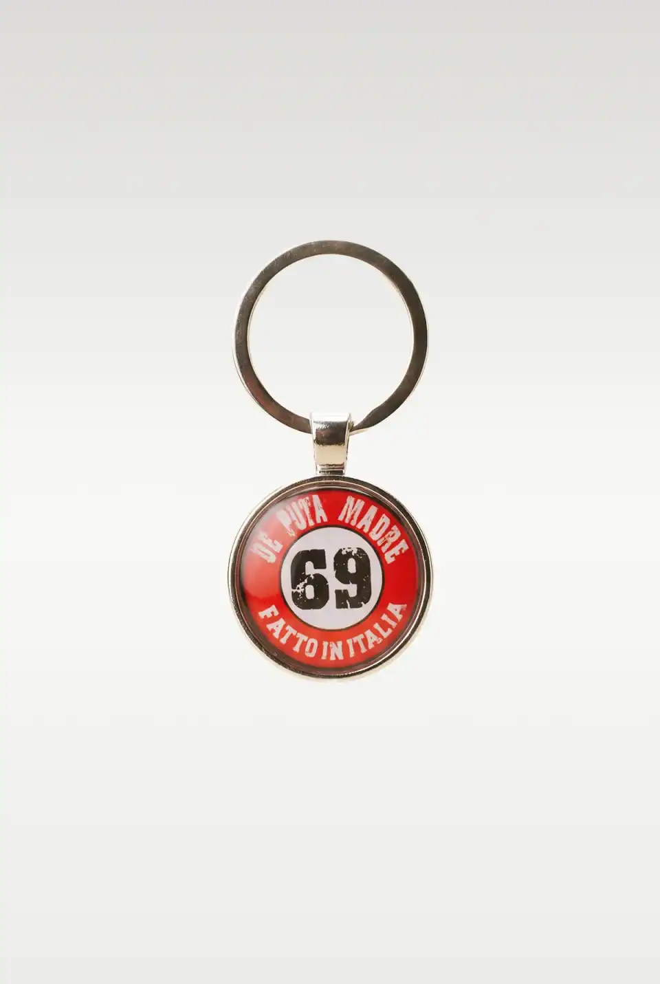 Bold Italian streetwear keychain with provocative graphic design and urban luxury style.