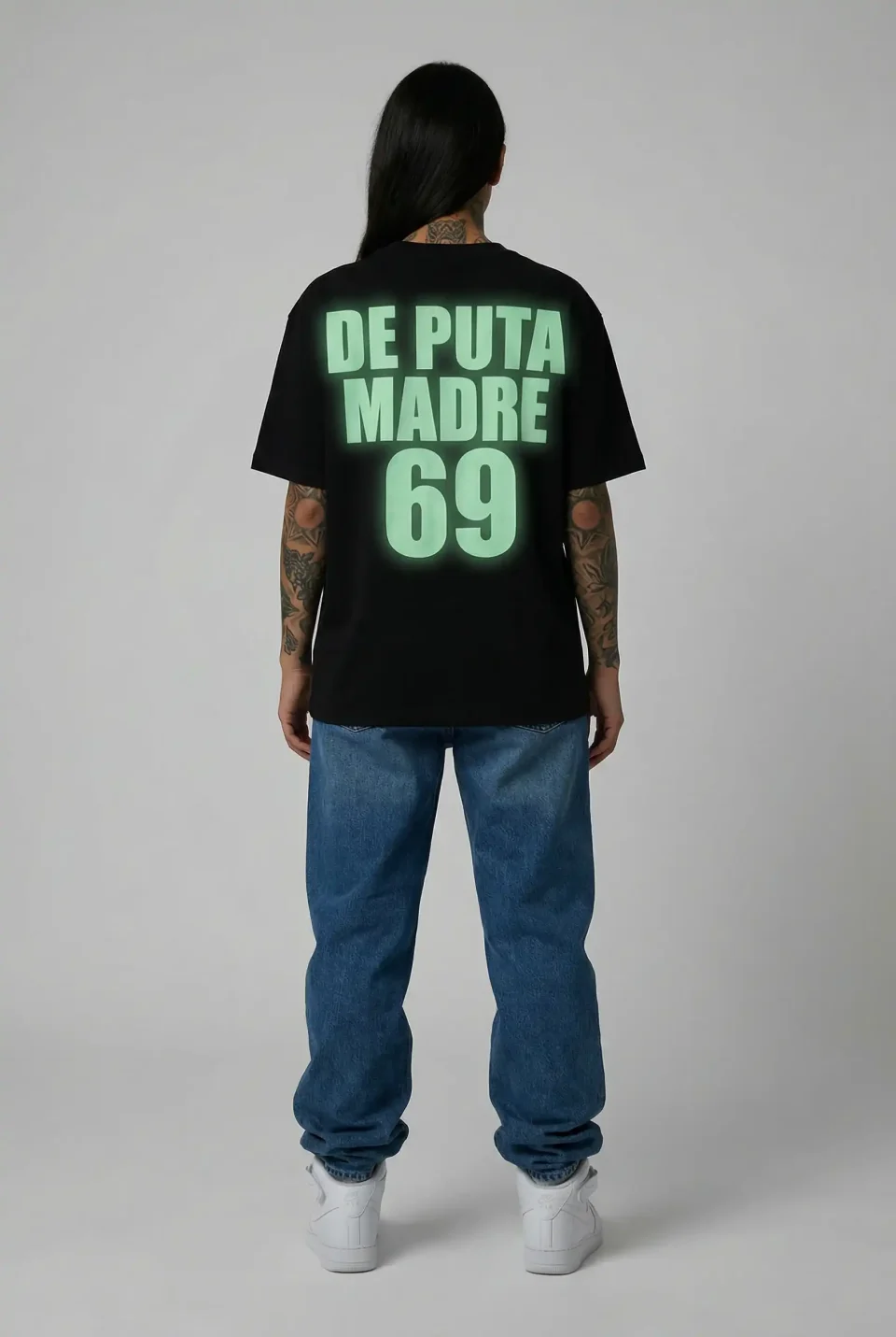 De Puta Madre 69, made in Italy, streetwear, oversized black T-shirt with bold graphic print.