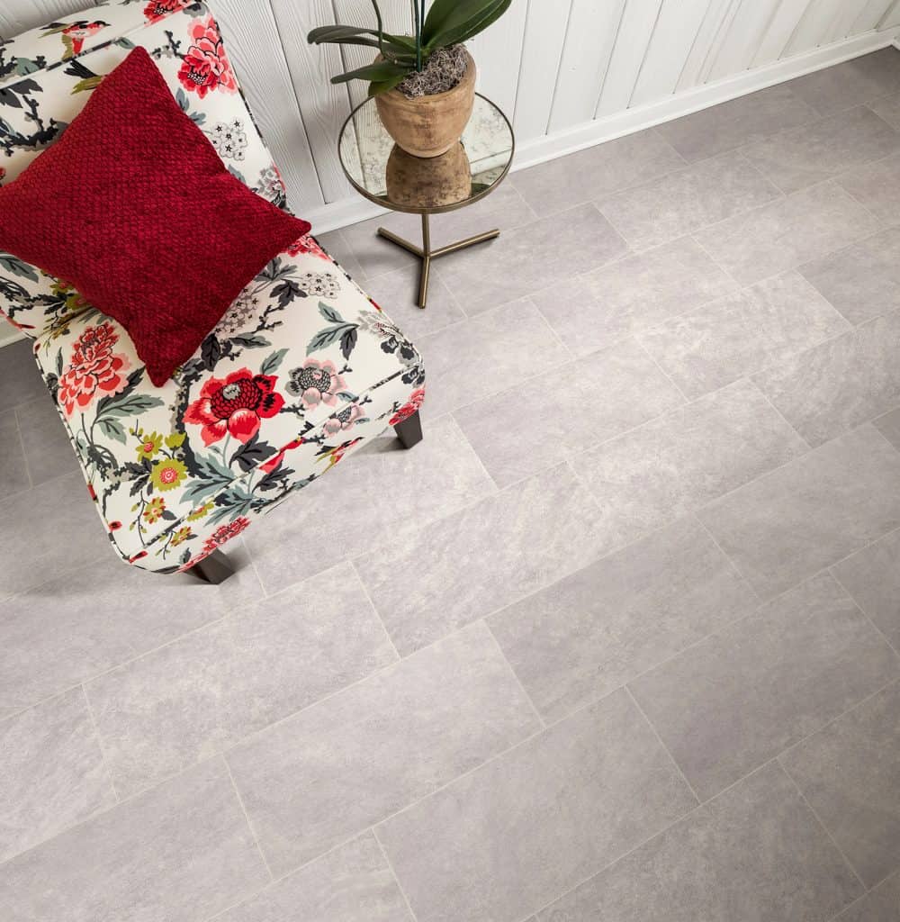 Floor with chair and table on it.