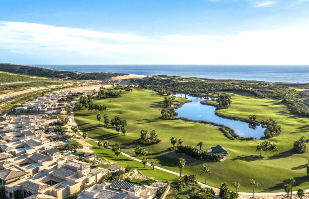 Aerial view of Diamante Cabo San Lucas golf course and oceanfront luxury homes overlooking the Pacific Ocean