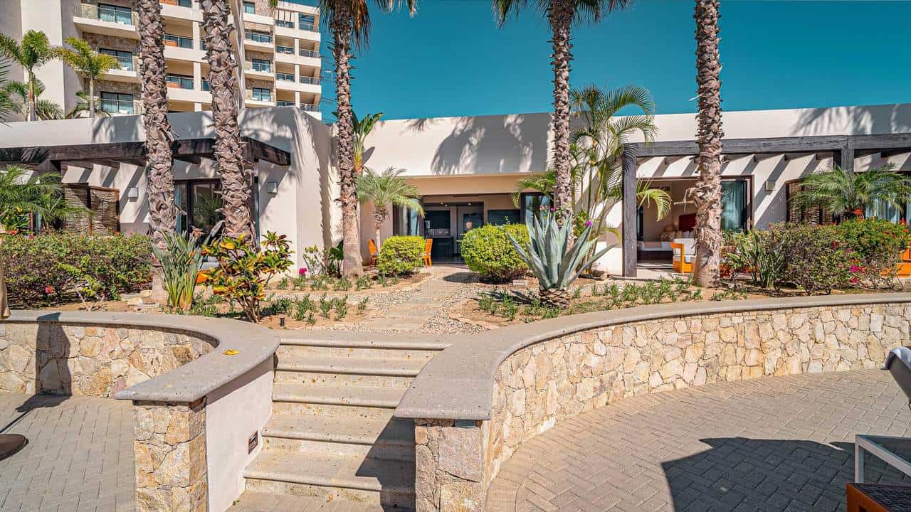 Luxurious Beachfront Condos At Diamante Cabo San Lucas With Lush Landscaping And Modern Amenities, Offering Stunning Ocean Views And High-End Living In Mexico. Diama.