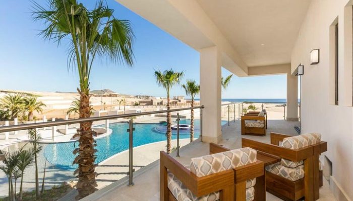 Oceanfront Pool And Terrace View – Diamante Beaches And Pools Luxury Balcony View Overlooking The Infinity Pool And Pacific Ocean At Diamante Beaches And Pools In Los Cabos.