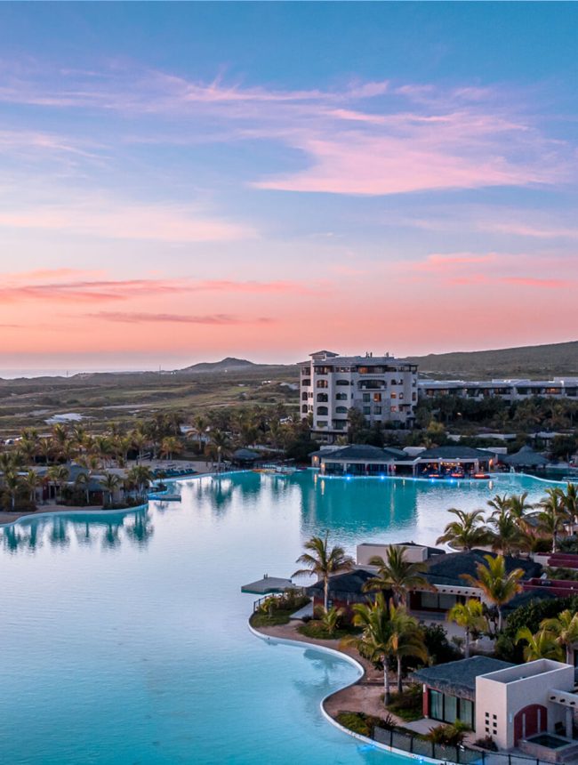 Crystal Lagoons® At Diamante Crystal Lagoons® At Diamante Los Cabos With Kayaks And Palm-Lined Beaches Under Clear Sky