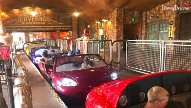 Families and friends aboard vibrant car-shaped vehicles navigate the whimsical cavern on Disneyland’s Roger Rabbit’s Car Toon Spin.