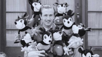 Walt Disney with Mickey dolls
