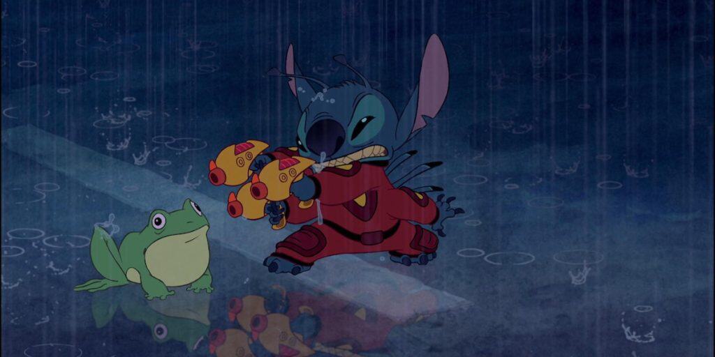 A blue alien creature wearing red armor stands in the rain, holding yellow toy guns like a character from Disney movie remakes, while a green frog sits on the wet ground. Rain creates ripples and reflections on the surface.