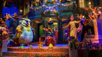 Colorful scene with animated animal characters and people dressed in Mardi Gras attire, performing music and dancing on a decorated, festive porch surrounded by flowers and lights, resembling a lively celebration.