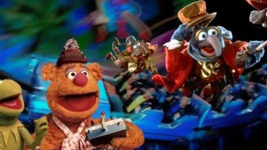 Kermit, Fozzie, Gonzo, and Rizzo the Rat excitedly join the Disney World virtual coaster queue on a bright Muppets adventure.